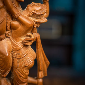 Drevený Krishna
